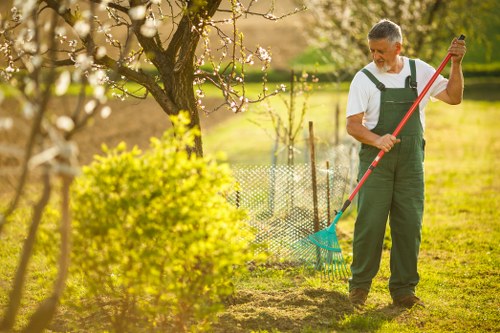 Garden debris being removed by a clearance team